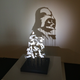 The shadow of Darth Vader looms.